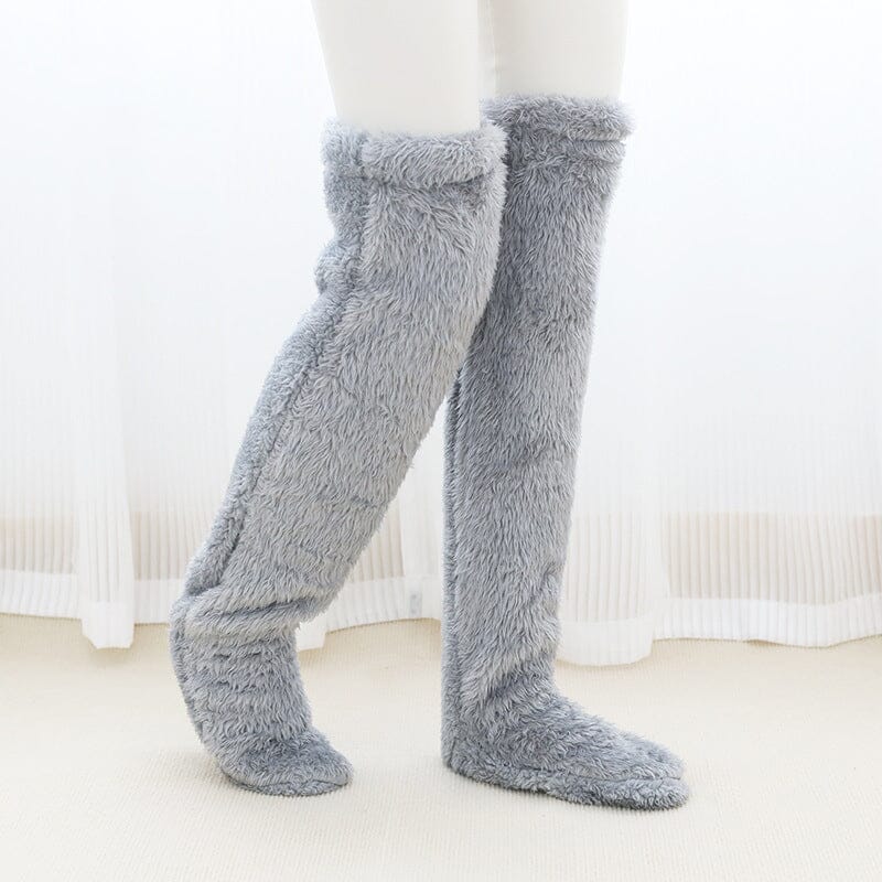 Chaussettes chauffantes aux genoux