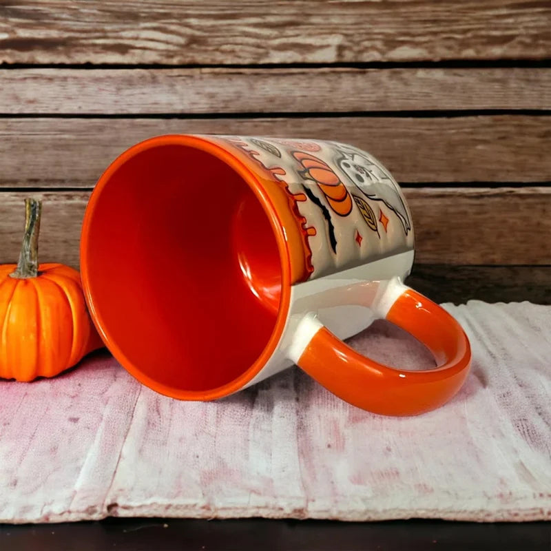 Tasse à café citrouille avec fantôme