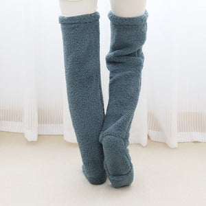 Chaussettes chauffantes aux genoux