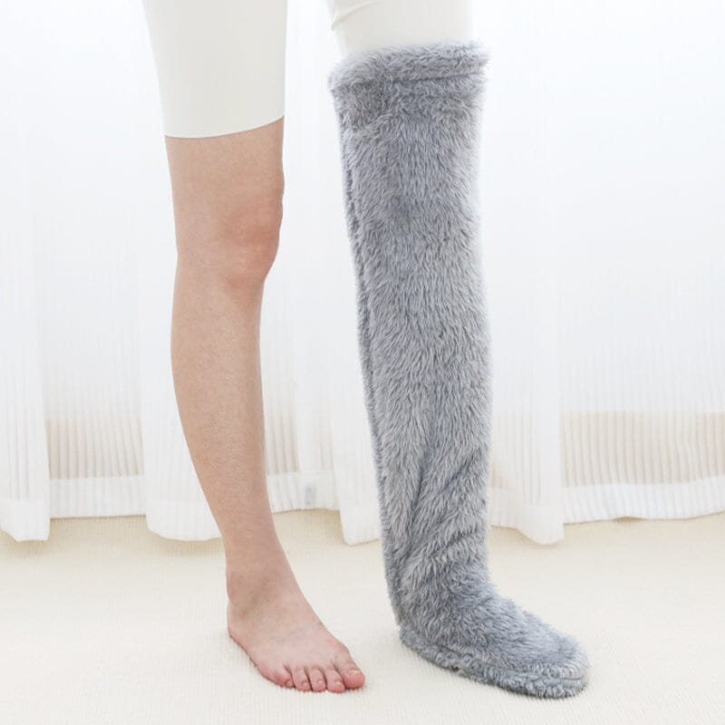 Chaussettes chauffantes aux genoux